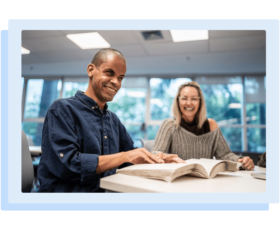 People reviewing learning materials